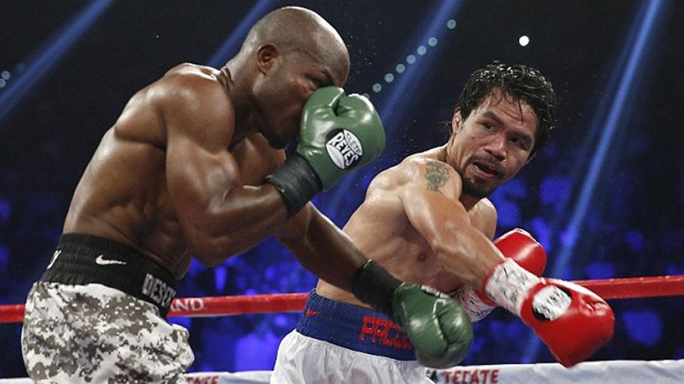 Petinju asal Filipina, Manny Pacquiao vs Floyd Mayweather. - INDOSPORT